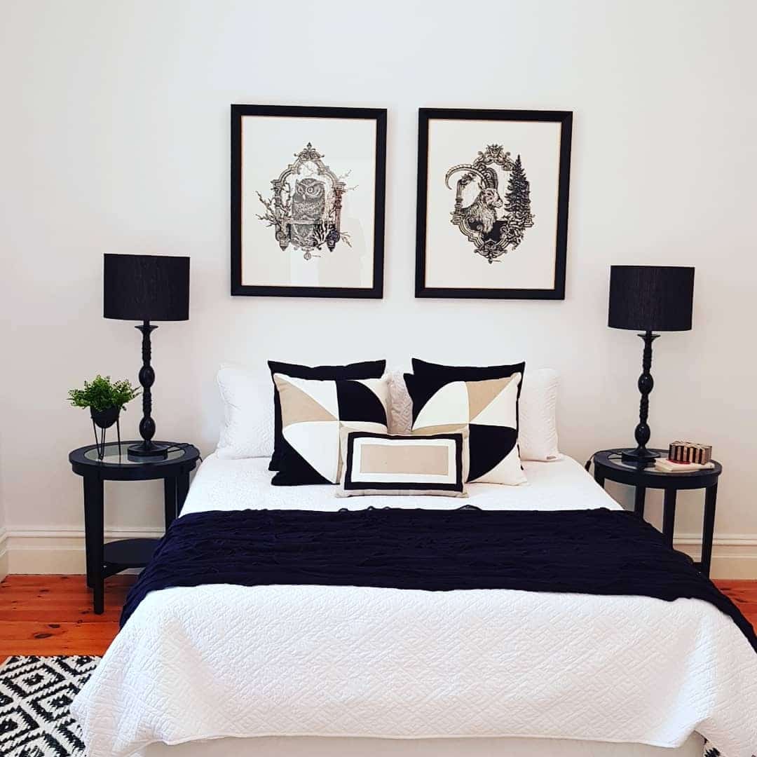 7. Balanced Black and White Bedroom with Symmetry - black and white bedroom ideas