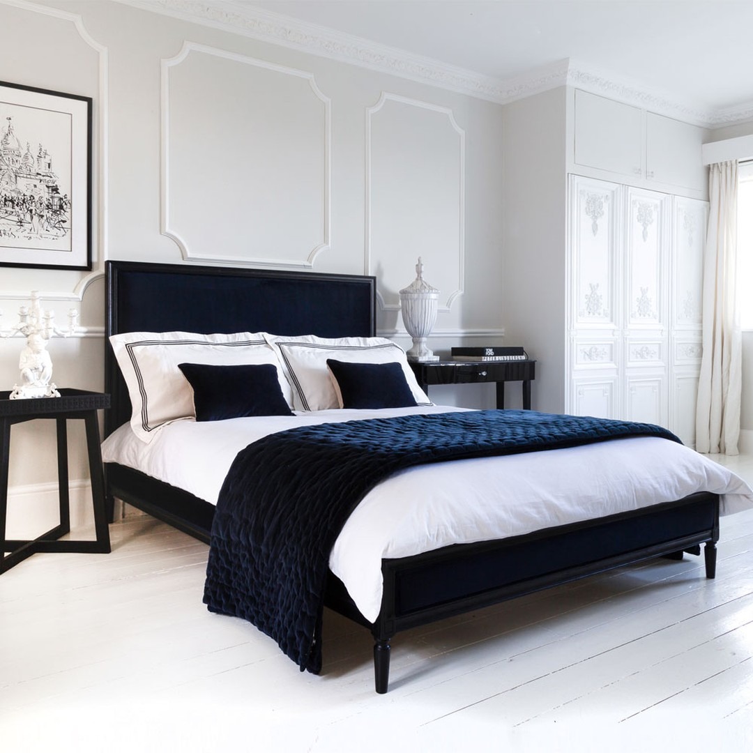 10. Refined Black and White Bedroom with Classic Detailing - black and white bedroom ideas