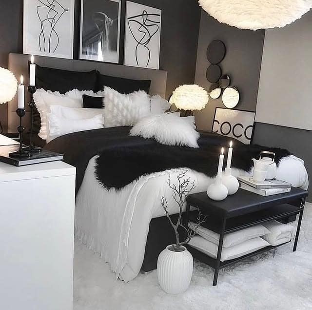 11. Layered Black and White Bedroom with Soft Textures - black and white bedroom ideas