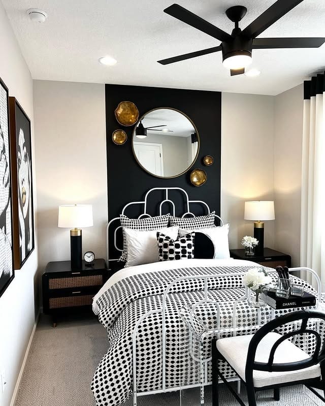 20. Modern Black and White Bedroom with Sculptural Metal Bed - black and white bedroom ideas