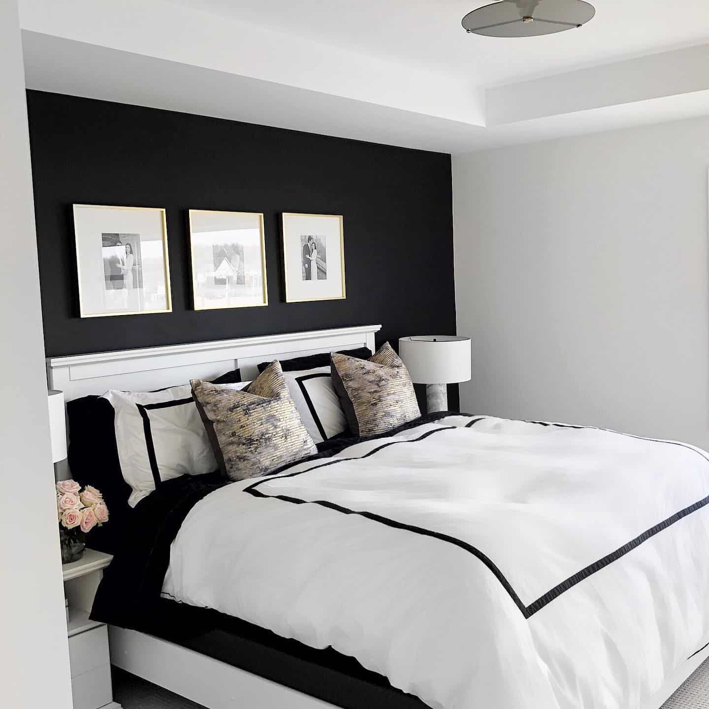 22. Minimal Black and White Bedroom with Bold Accent Wall - black and white bedroom ideas
