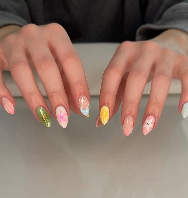 2. Mixed Pastel Abstract Almond Nails - mexico nail ideas