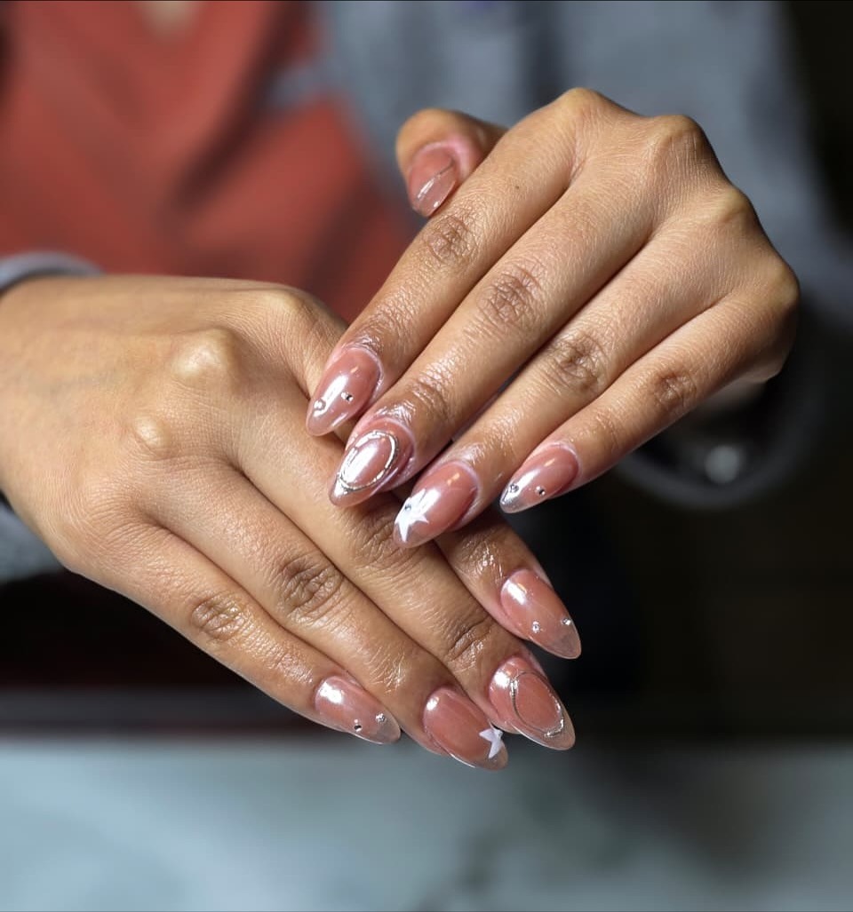 11. Nude Gloss Almond Nails with White Star Accents - mexico nail ideas