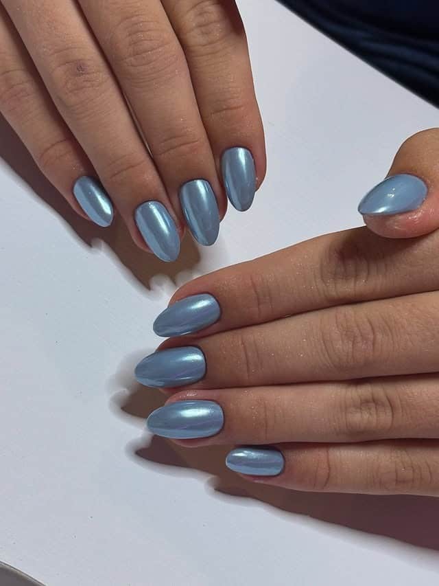 1. Icy Blue Chrome Almond Nails - ice nail ideas