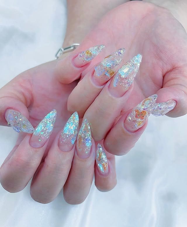4. Iridescent Ice Glitter Stiletto Nails - ice nail ideas