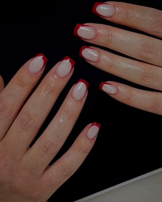 15. Classic Sheer Nude Square Nails with Red French Tips - ice nail ideas