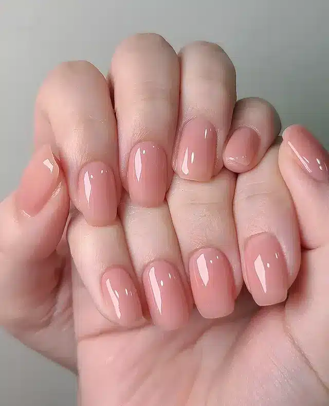 19. Glossy Nude Natural Square Nails - ice nail ideas