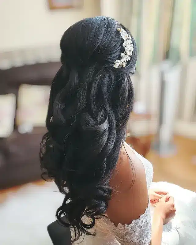 2. Romantic Half-Up Glossy Black Waves - Vintage Curls Hairstyles