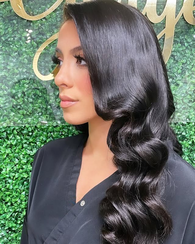 5. Deep Side-Part Hollywood Waves in Jet Black - Vintage Curls Hairstyles