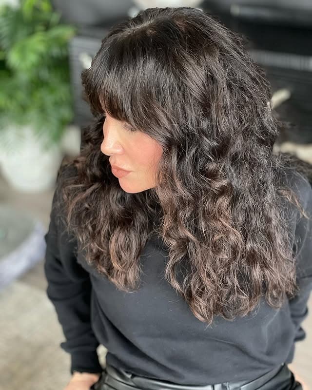 6. Textured Brunette Shag with Natural Waves - Vintage Curls Hairstyles