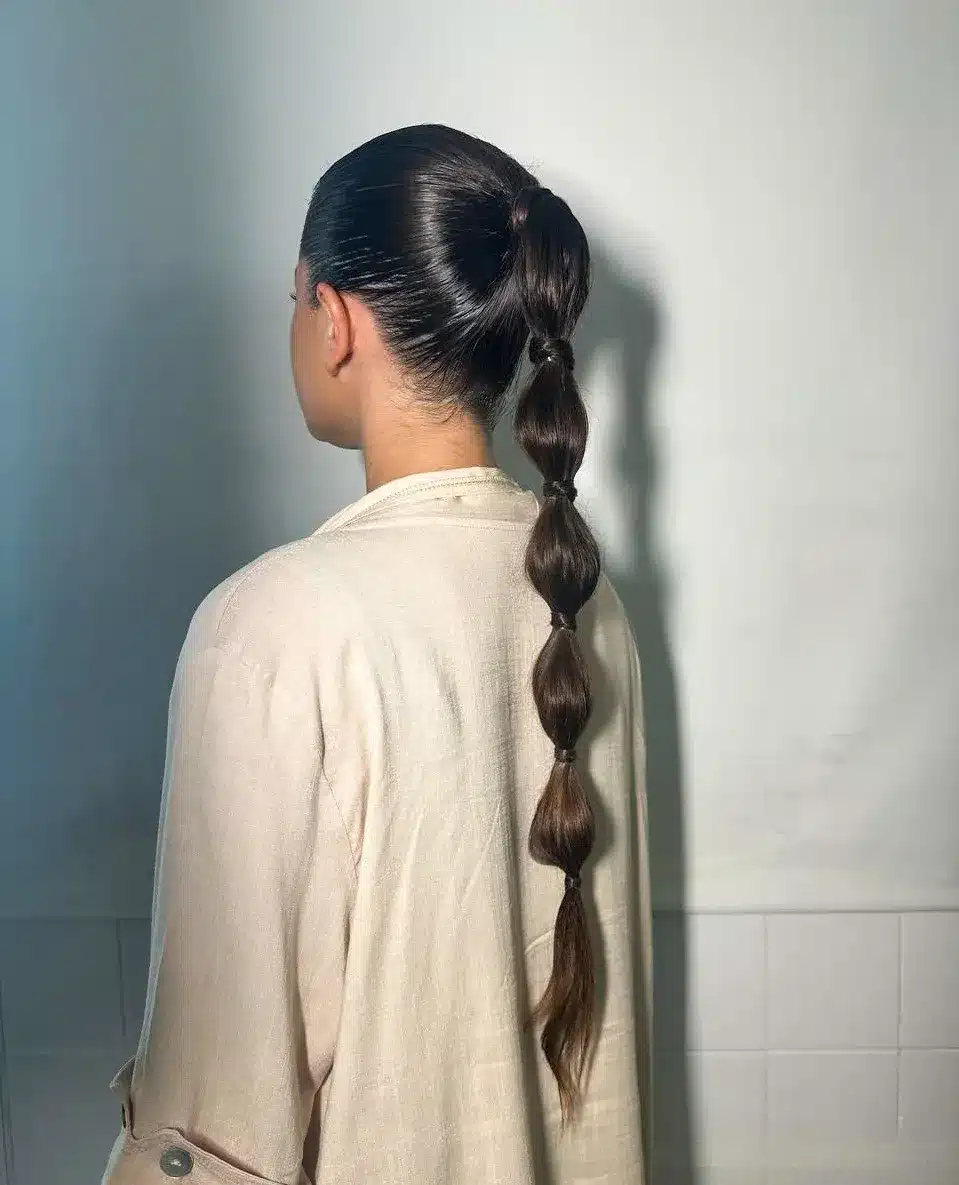 5. Classic Dark Brunette Bubble Ponytail - Bubble Ponytail