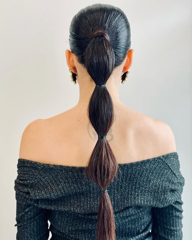 20. Classic Jet Black Sleek Bubble Ponytail - Bubble Ponytail