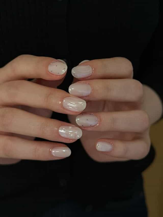 5. Soft White Minimal Accent Nails - simple nail ideas