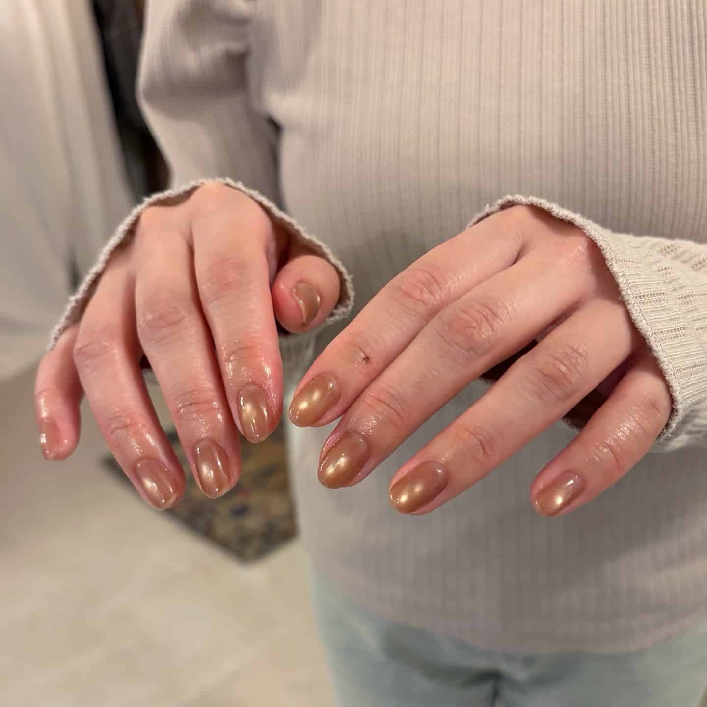 13. Bronze Chrome Short Almond Nails - simple nail ideas