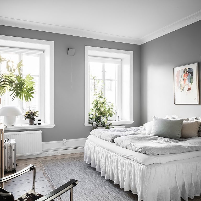 18. Airy Light Gray Bedroom with Minimal Styling - gray bedroom ideas