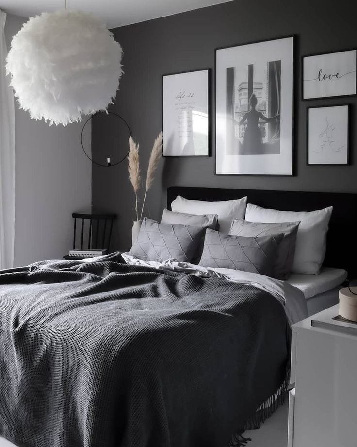 20. Moody Gray Bedroom with Soft Textiles and Wall Art - gray bedroom ideas