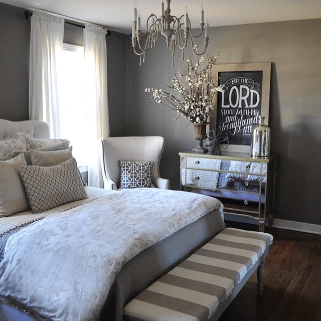 22. Classic Gray Bedroom with Soft White Layers and Vintage Touches - gray bedroom ideas