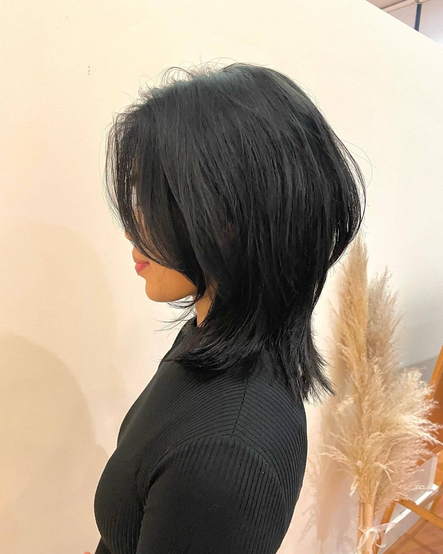 1. Jet Black Layered Wolf Cut with Soft Tapered Ends - Short Wolf Haircut