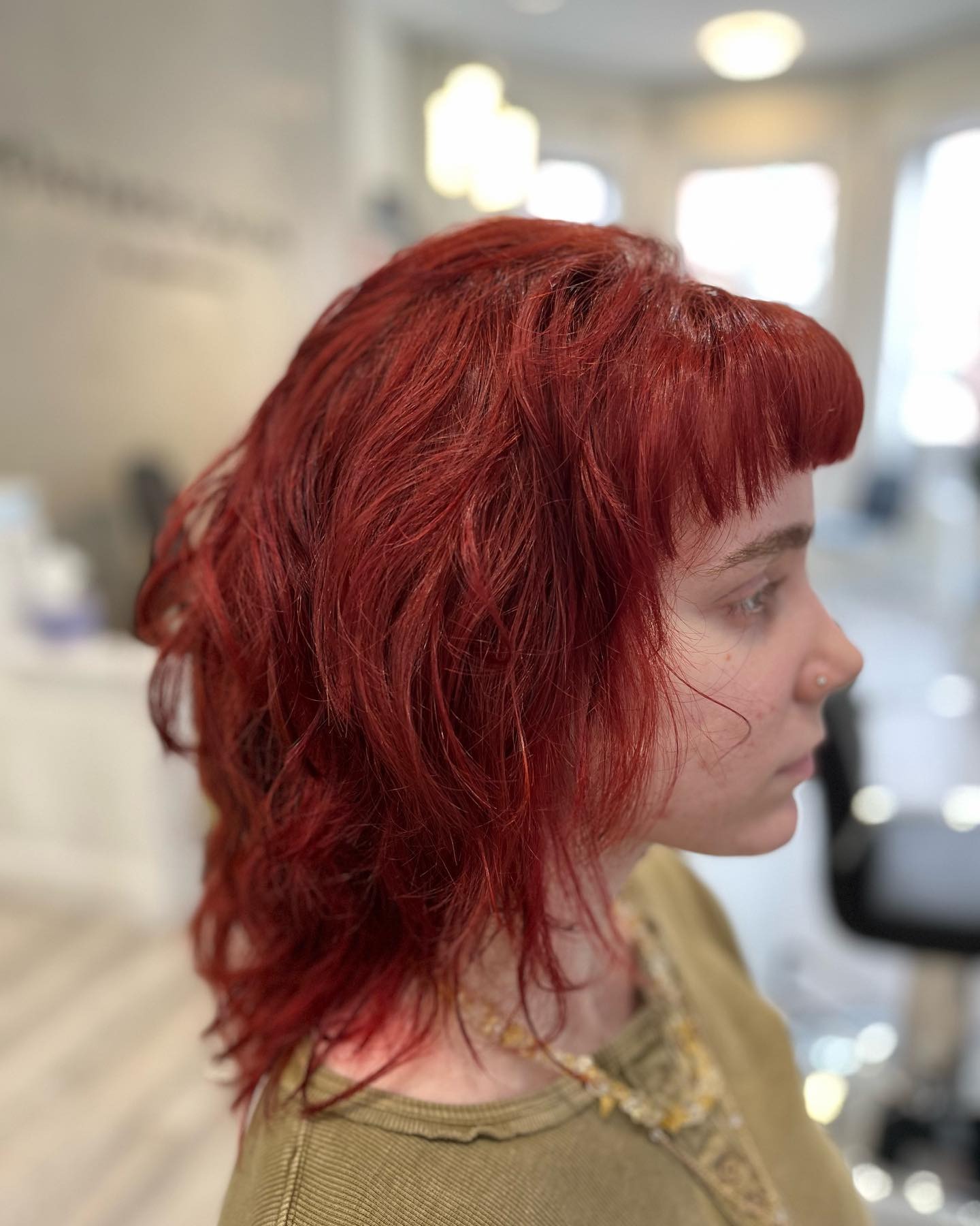 4. Vibrant Red Choppy Wolf Cut with Micro Fringe - Short Wolf Haircut