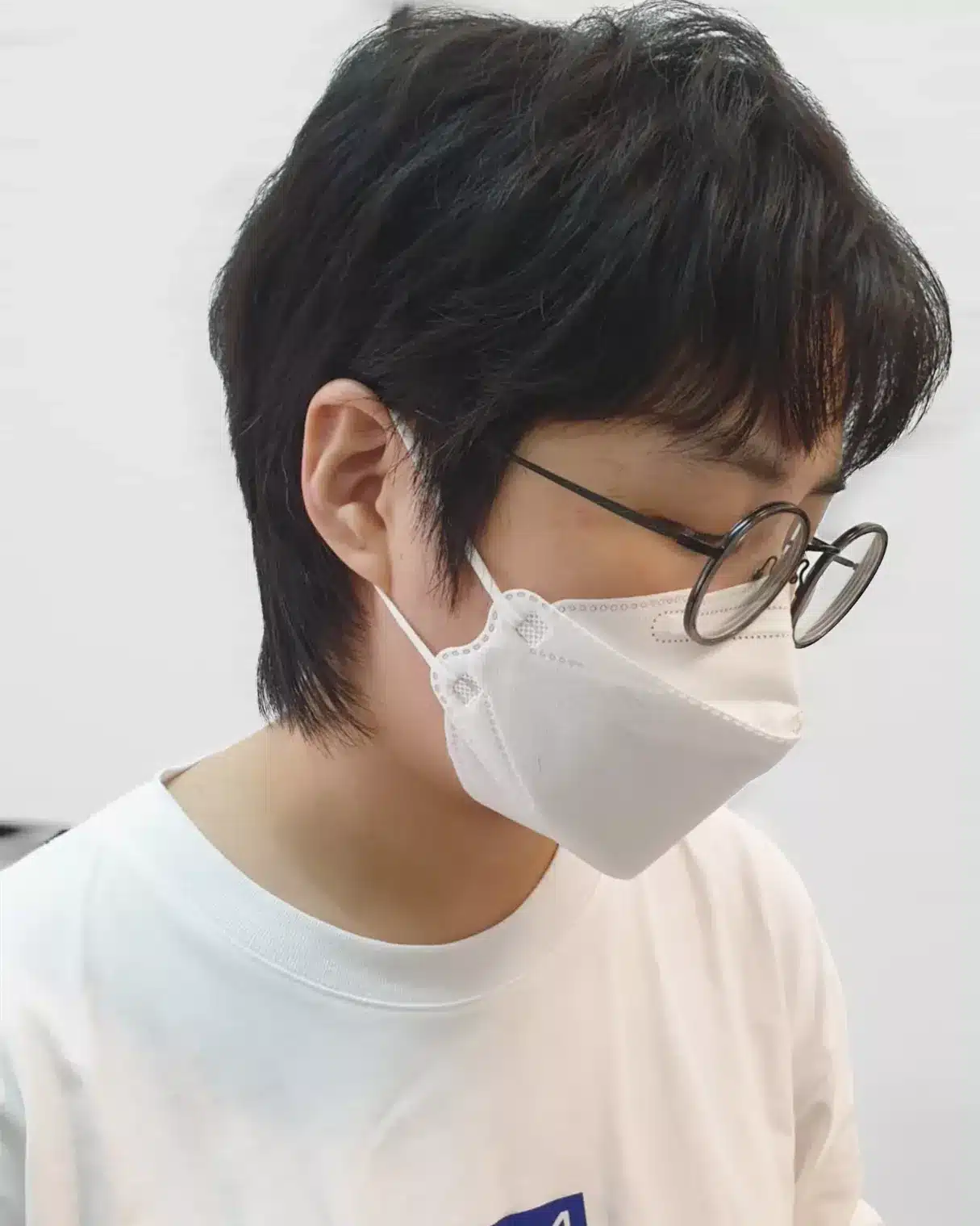 13. Deep Black Tapered Short Wolf Cut with Clean Nape - Short Wolf Haircut