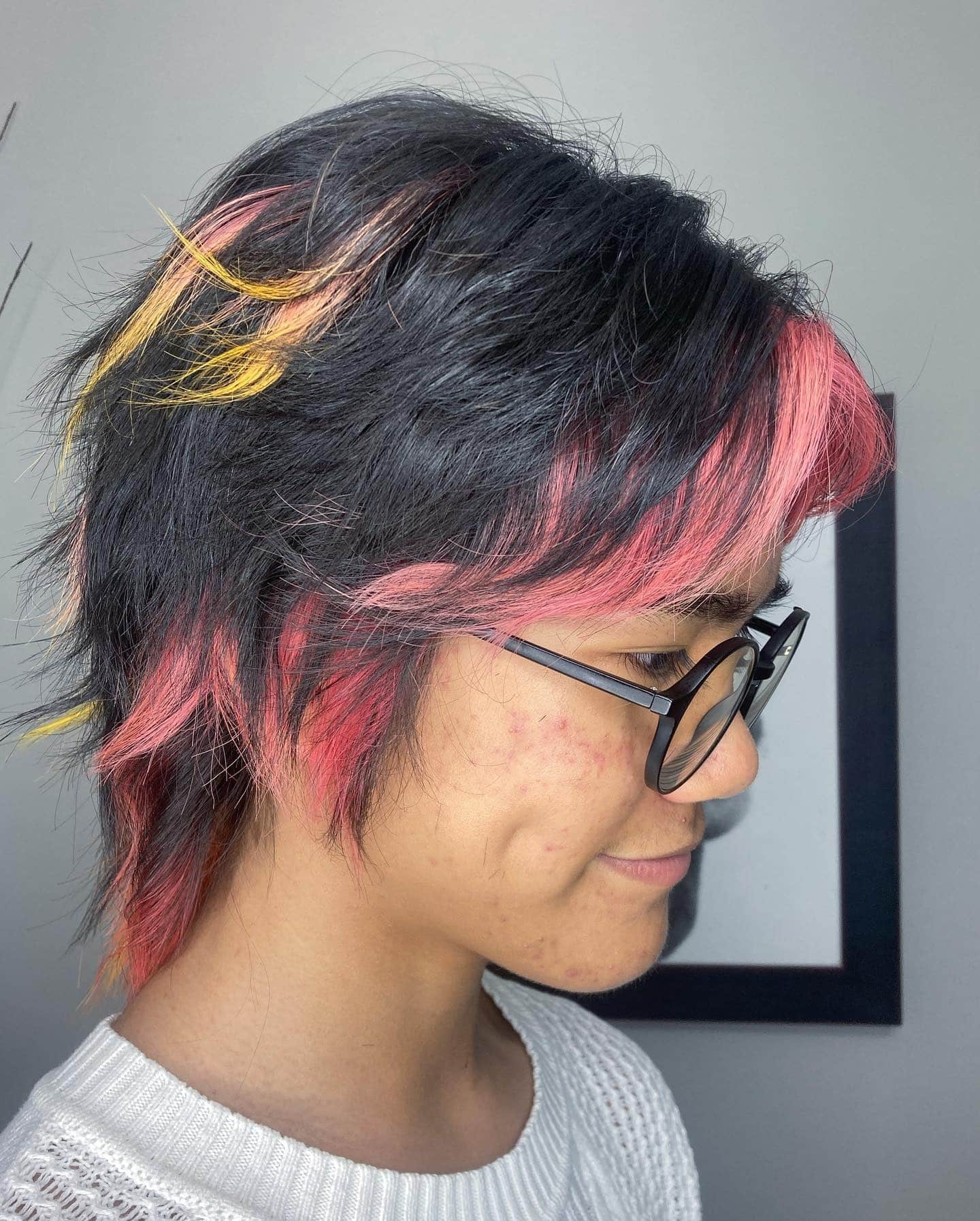 15. Black Wolf Cut with Pink and Yellow Accent Panels - Short Wolf Haircut