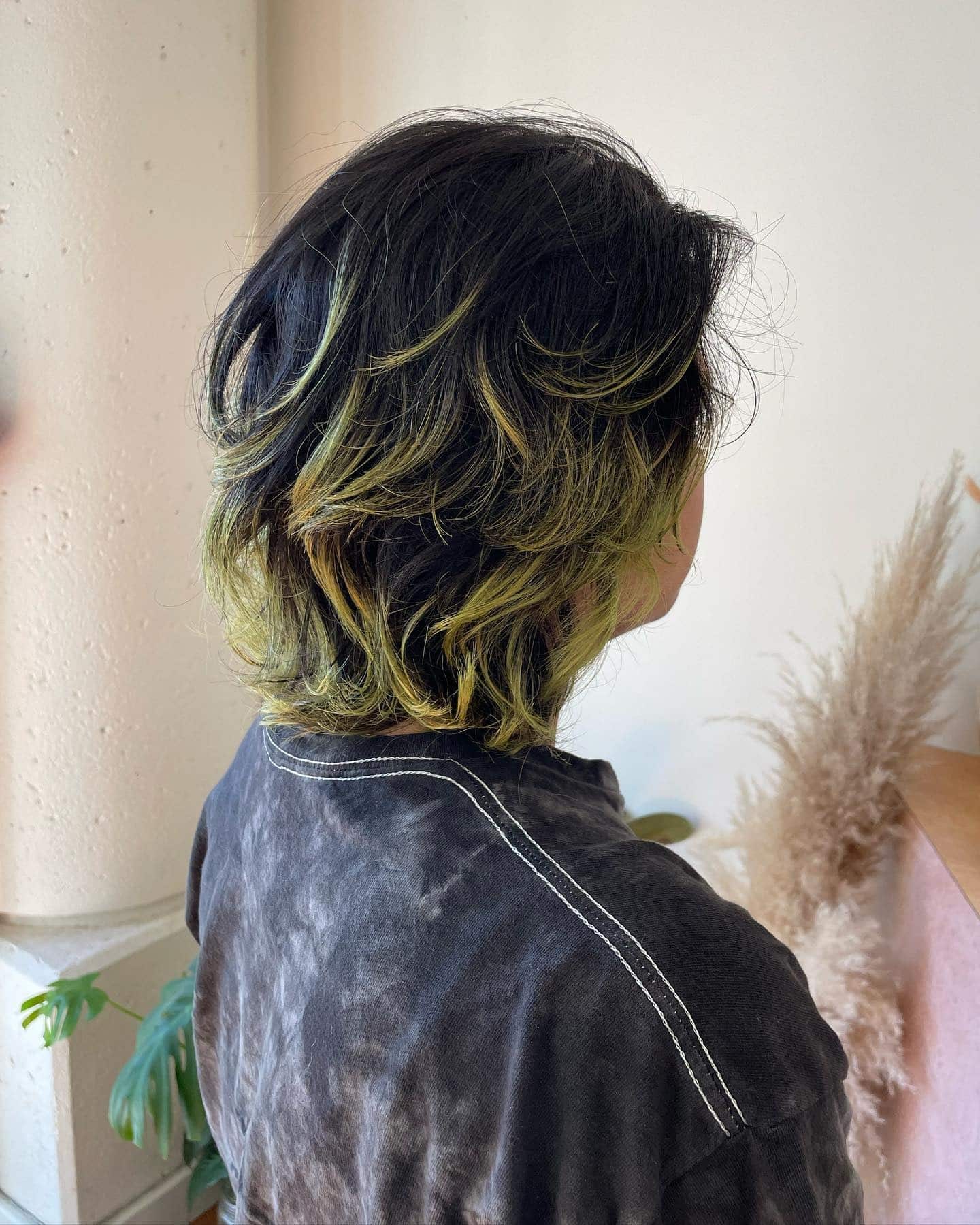 16. Black and Neon Green Layered Wolf Bob - Short Wolf Haircut