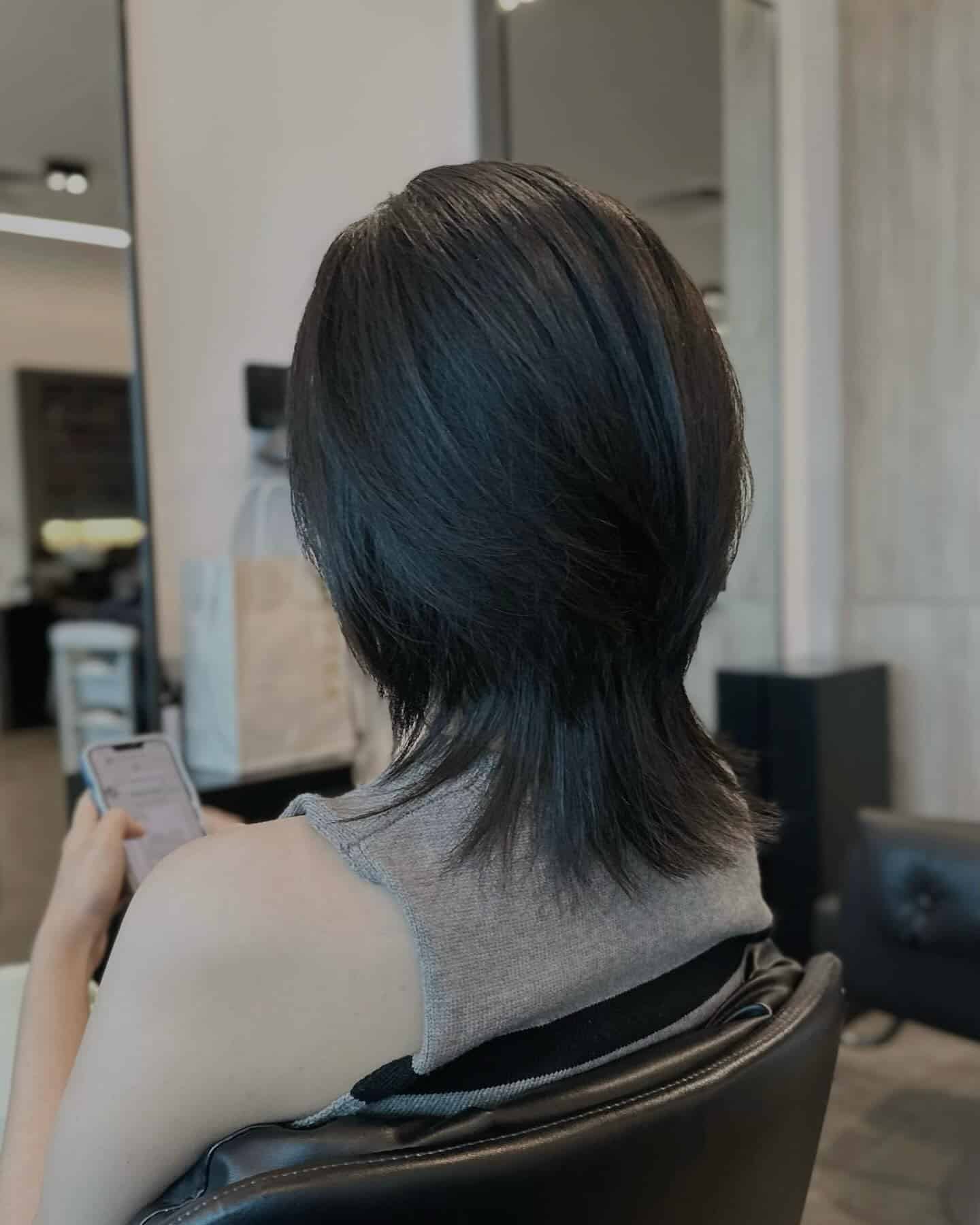 21. Soft Black Layered Wolf Cut with Tapered Nape - Short Wolf Haircut