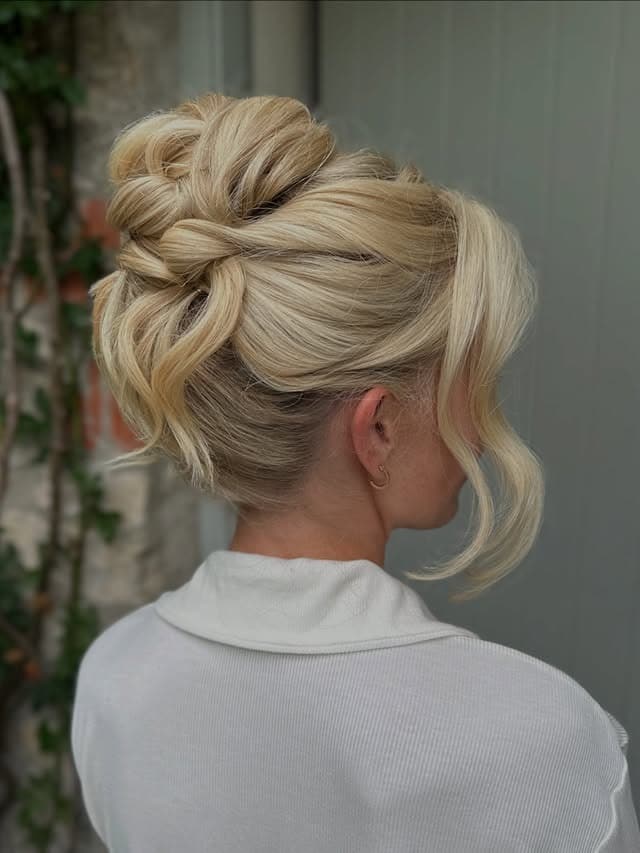 4. Chocolate Brown Low Textured Bun - Medium Length Hair Messy Updos