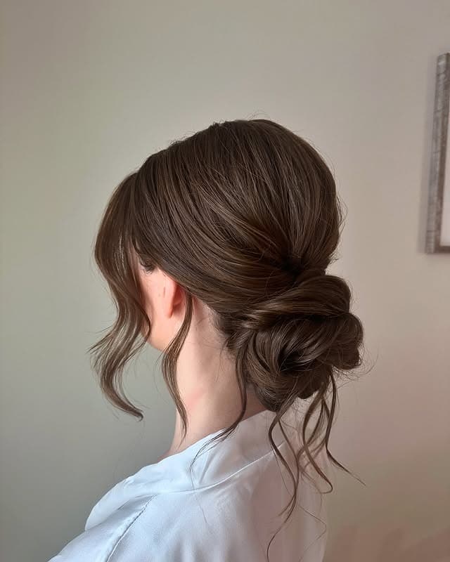 5. Ash Blonde Low Knotted Bun - Medium Length Hair Messy Updos