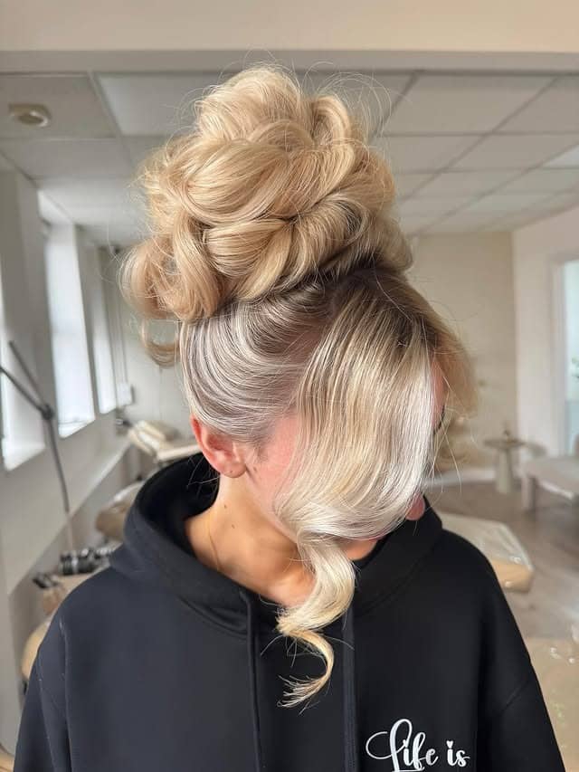 8. Beige Blonde Looped Messy Bun - Medium Length Hair Messy Updos