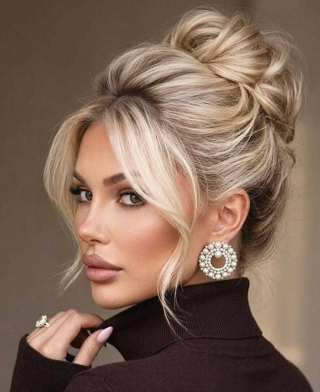 14. Icy Blonde Airy Messy Bun - Medium Length Hair Messy Updos