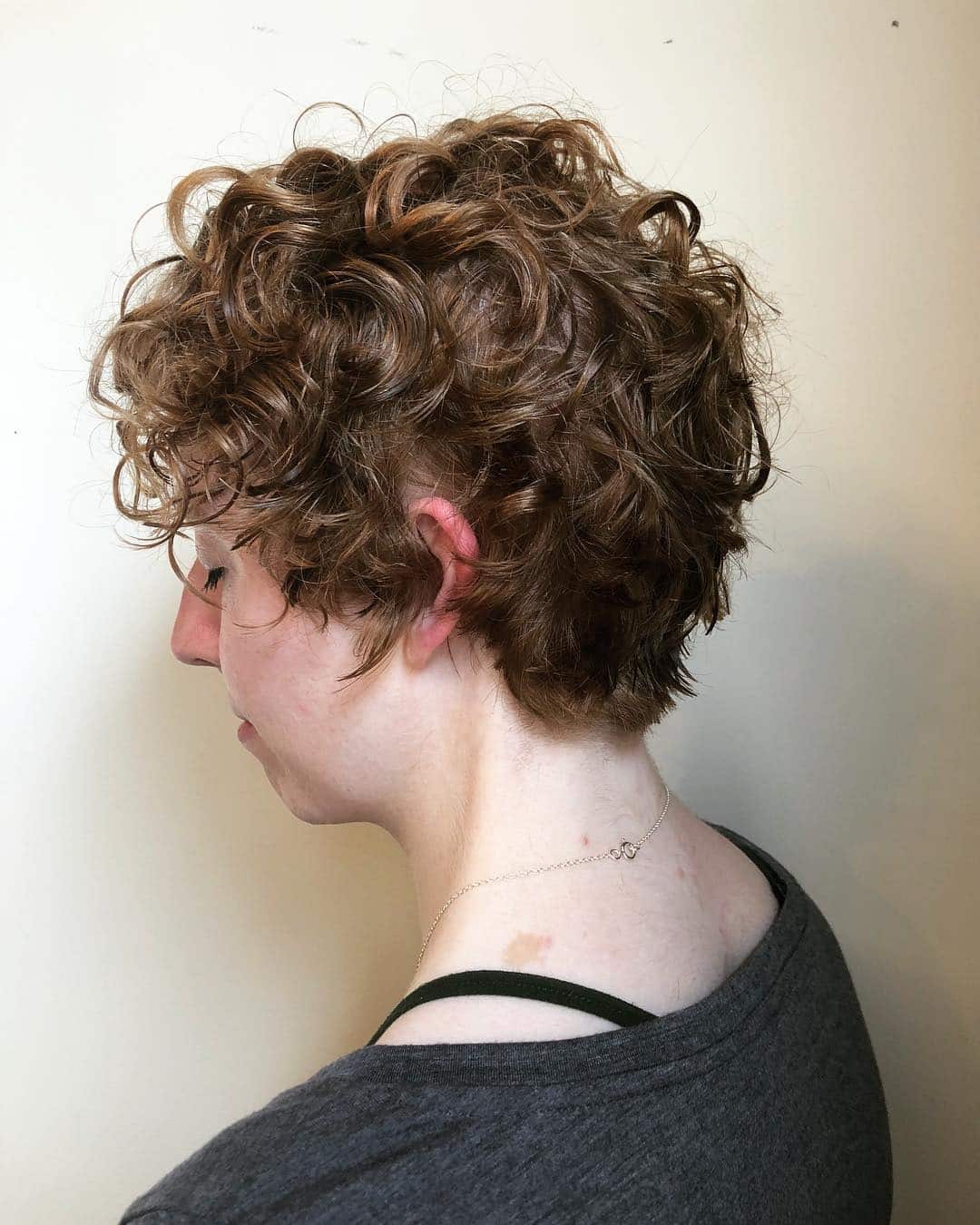 2. Warm Auburn Curly Pixie with Natural Texture - Curly Pixie Cut