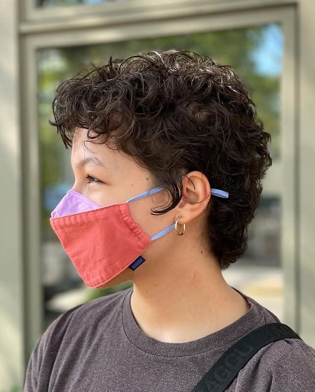 3. Deep Brunette Curly Crop with Side Contour - Curly Pixie Cut