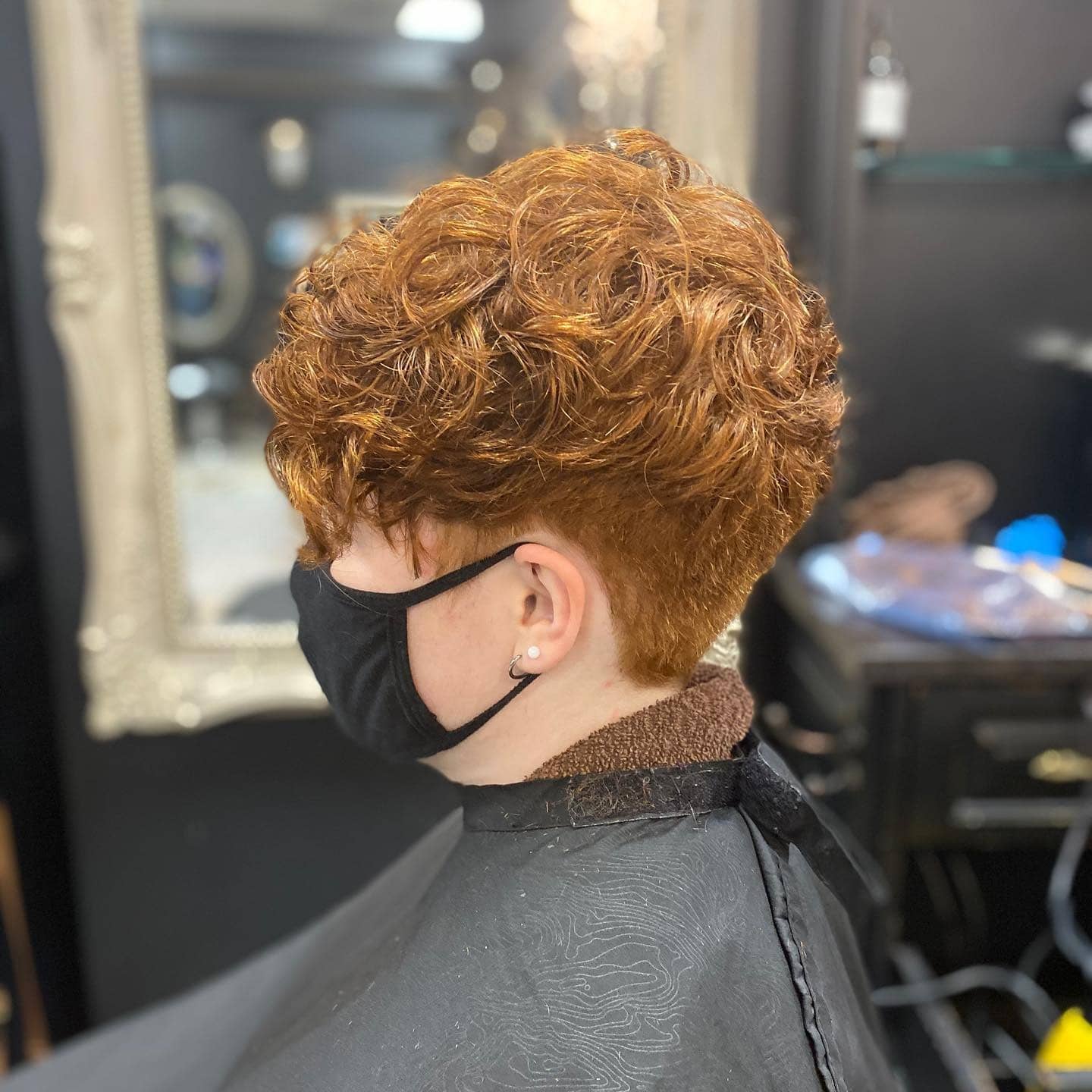 5. Rich Ginger Curly Pixie with Volume Crown - Curly Pixie Cut