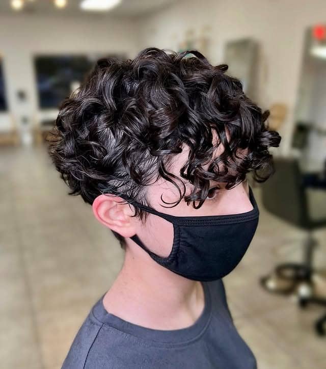 14. Dark Brunette Curly Pixie with Forward Texture - Curly Pixie Cut