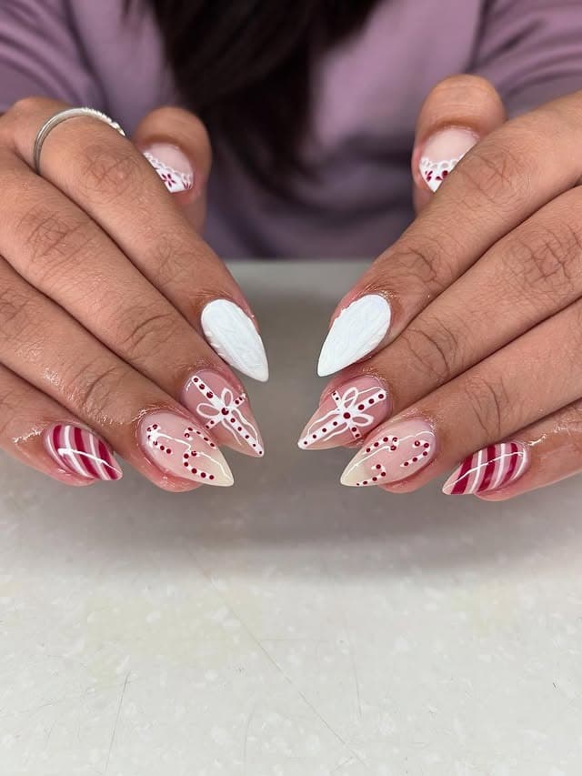 5. Candy Cane French Tip with White and Red Detailing - christmas dip nail ideas