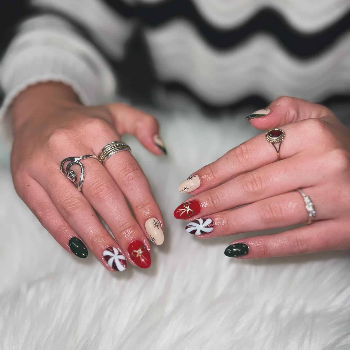 10. Minimal Holiday Nails with Bow and Star Accents - christmas dip nail ideas