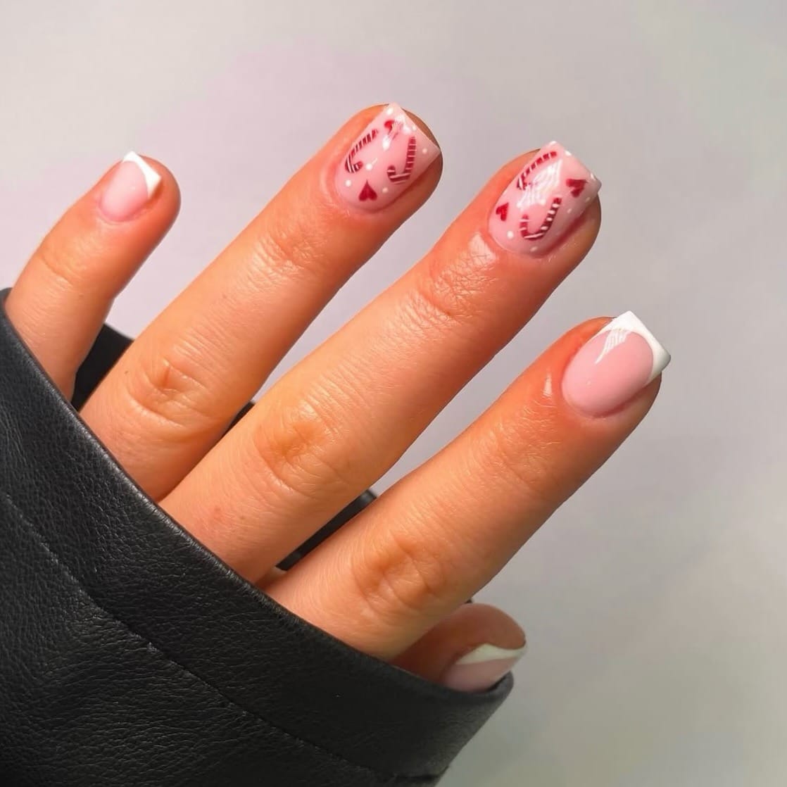 16. Short French Tip Nails with Candy Cane Heart Art - christmas dip nail ideas