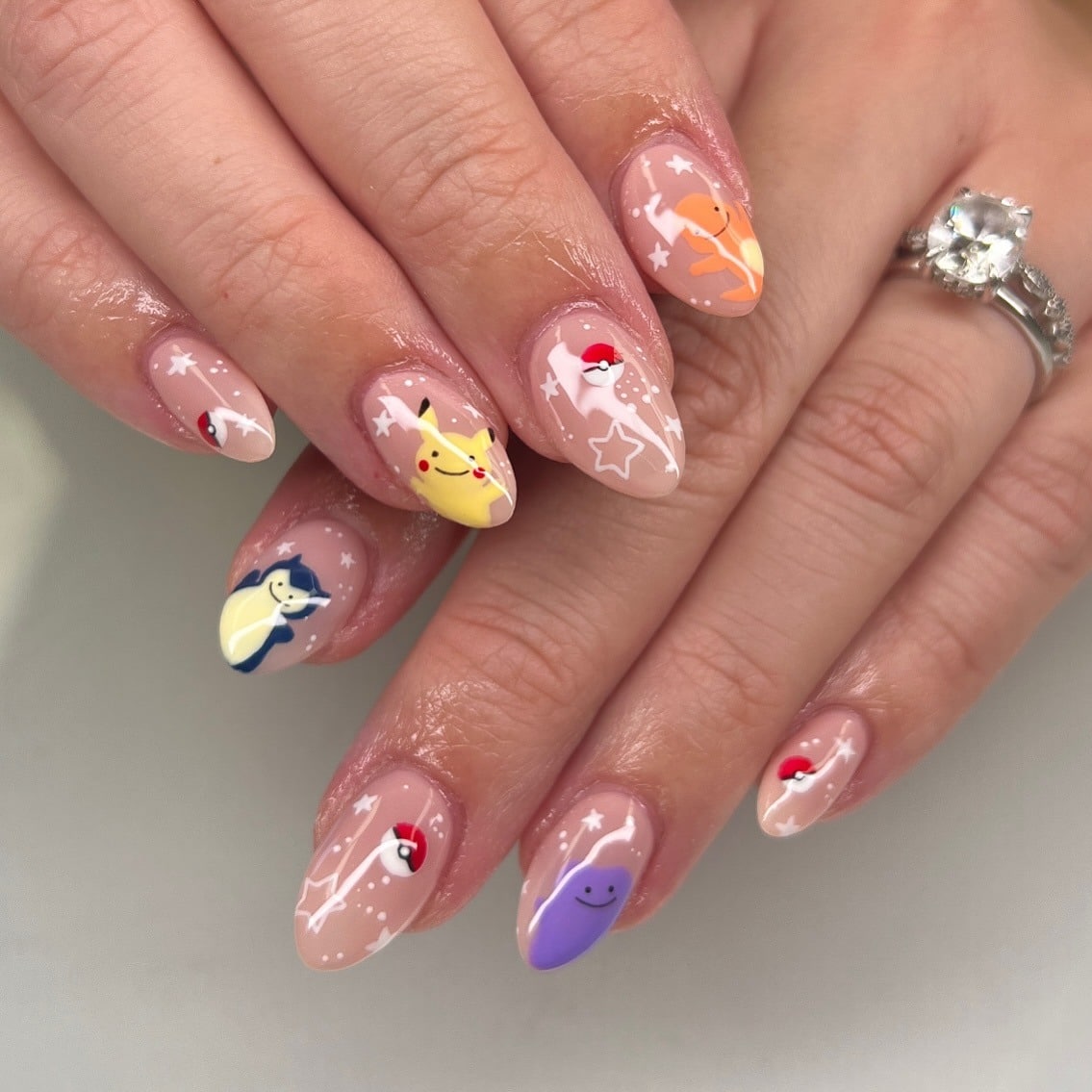 8. Playful Character Nail Art with Glossy Finish - cute nail ideas