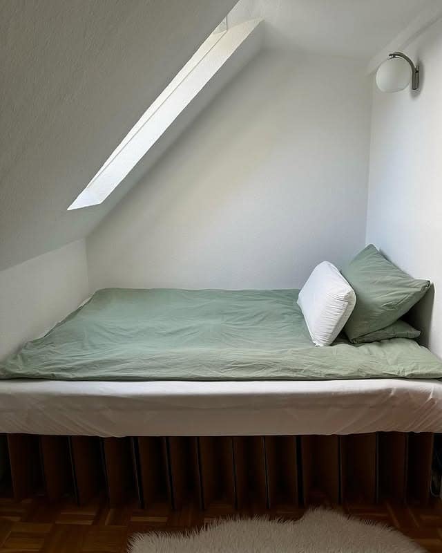 11. Sloped Ceiling Nook Bedroom in Soft Green and White - tiny bedroom ideas