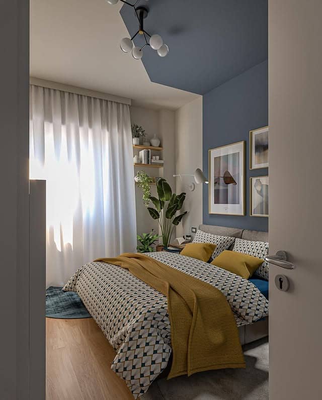 12. Modern Blue Accent Bedroom with Mustard Details - tiny bedroom ideas