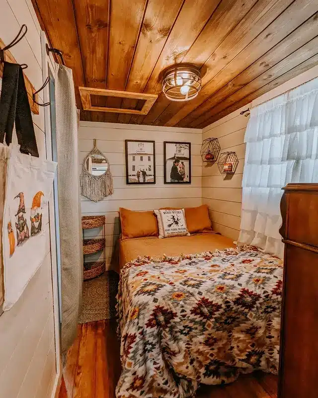 21. Rustic Cabin-Inspired Tiny Bedroom in Warm Wood and Terracotta - tiny bedroom ideas