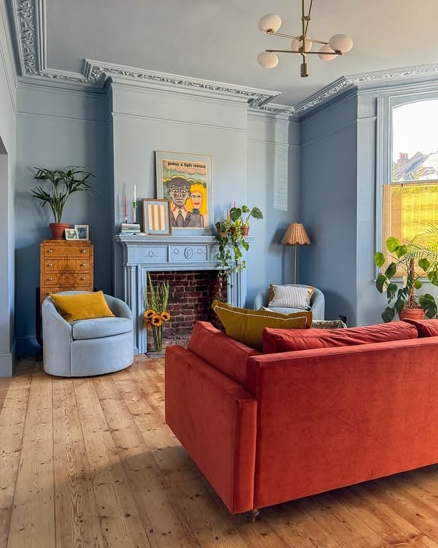 7. Dusty Blue Living Room with Warm Rustic Accents - blue living room ideas