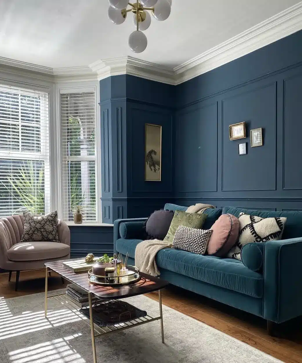 15. Paneled Blue Living Room with Contemporary Styling - blue living room ideas