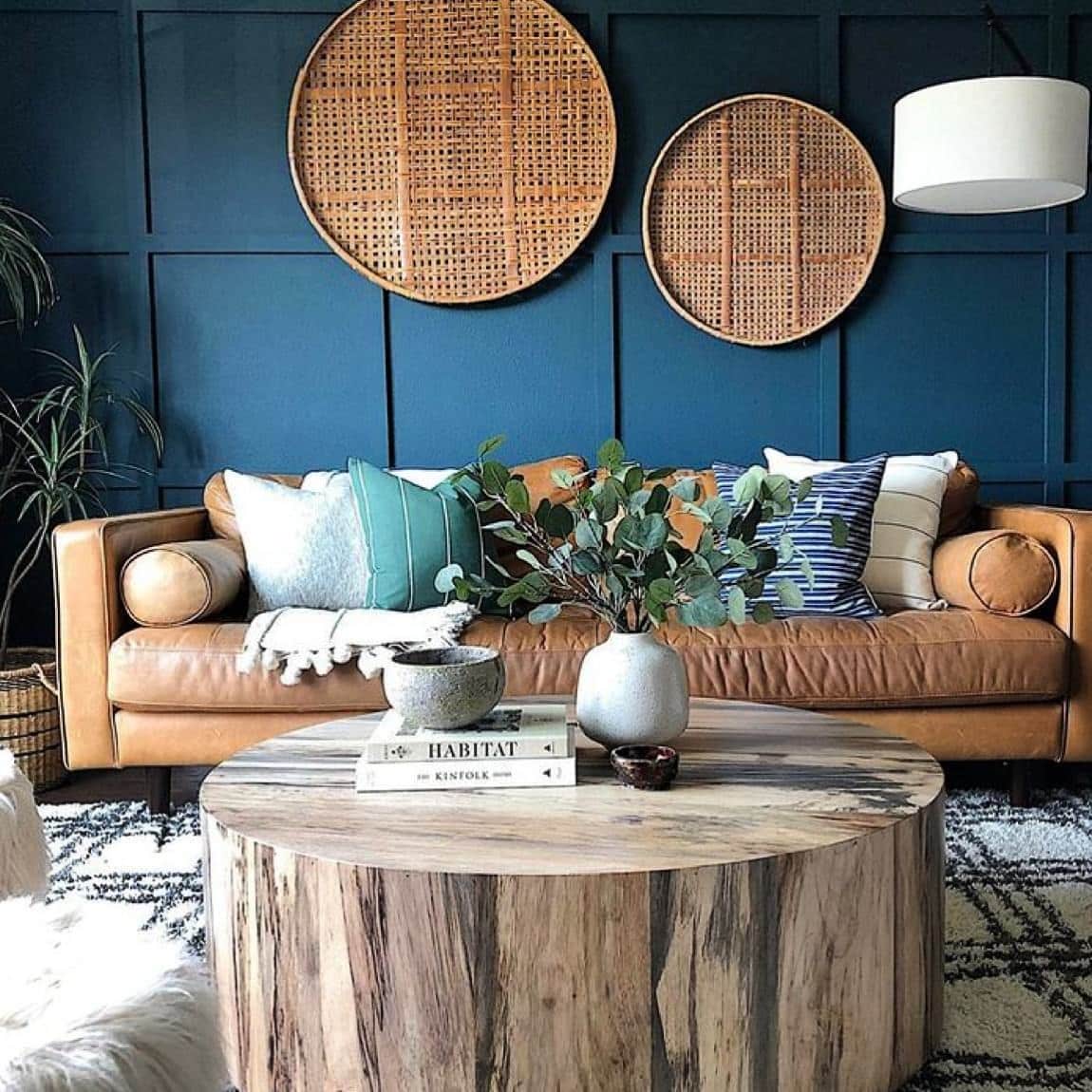 20. Dark Blue Living Room with Leather Sofa Contrast - blue living room ideas