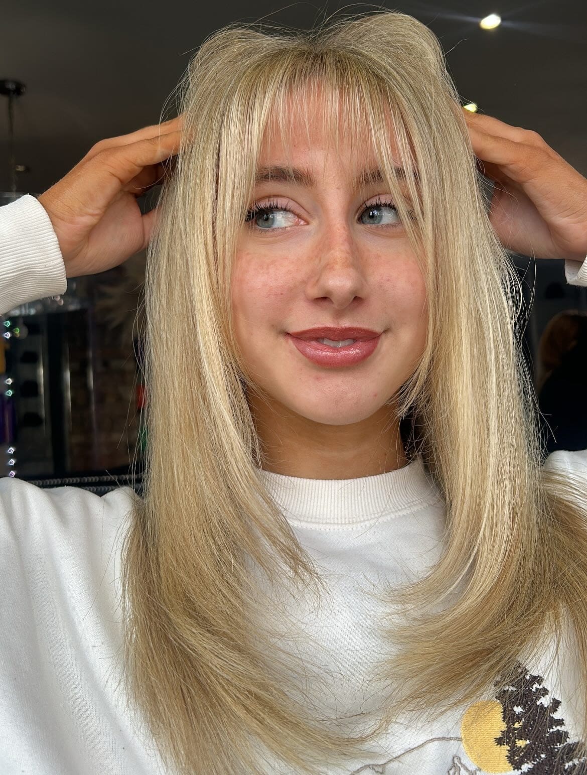 15. Creamy Vanilla Blonde Straight Layers with Fine Wispy Fringe - Wispy Bangs Hairstyles