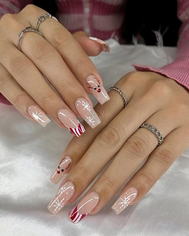 3. Nude Coffin Nails with Snowflakes and Candy Cane Stripes - christmas nail ideas