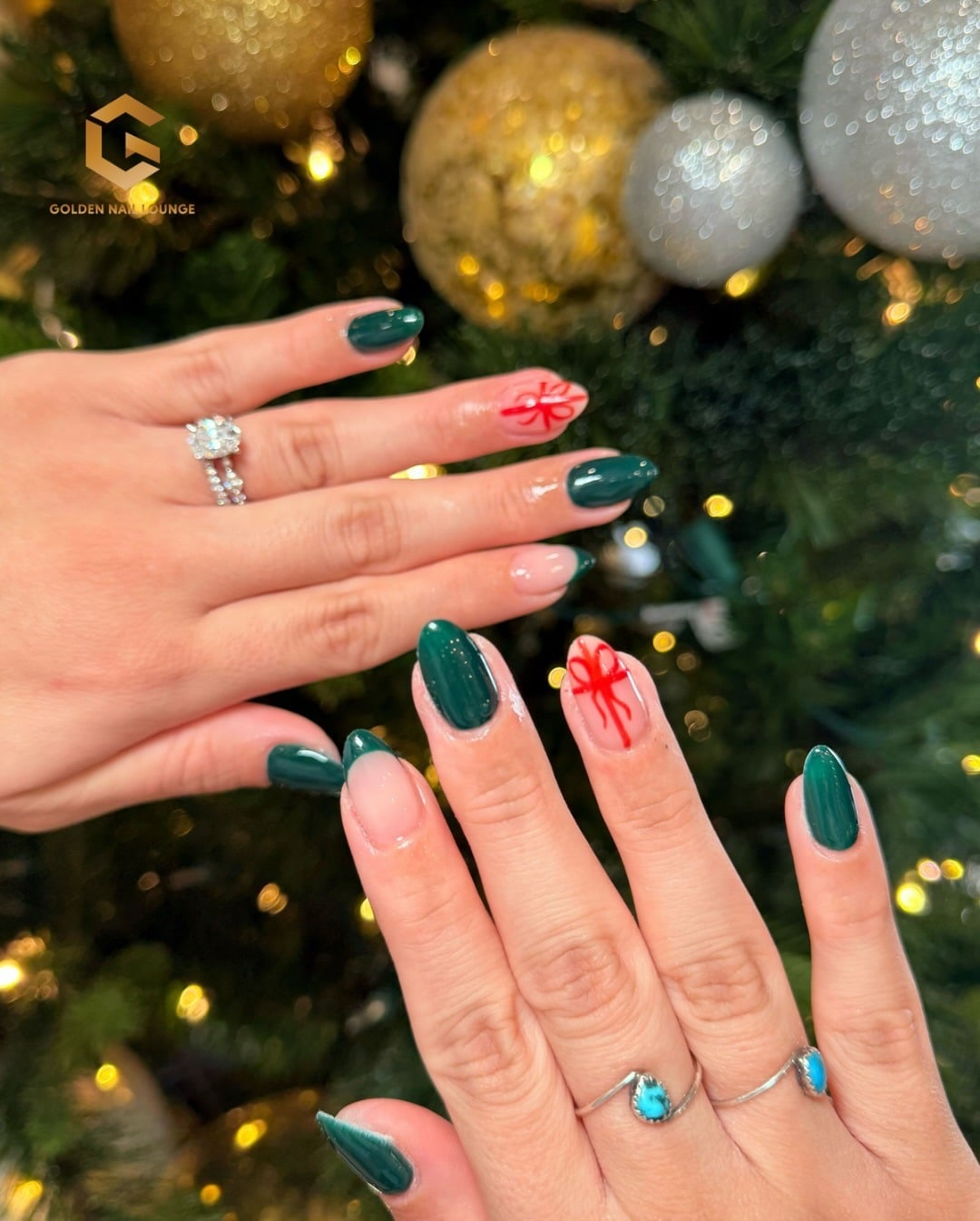 5. Glossy Emerald and Gift Bow Accent Nails - christmas nail ideas
