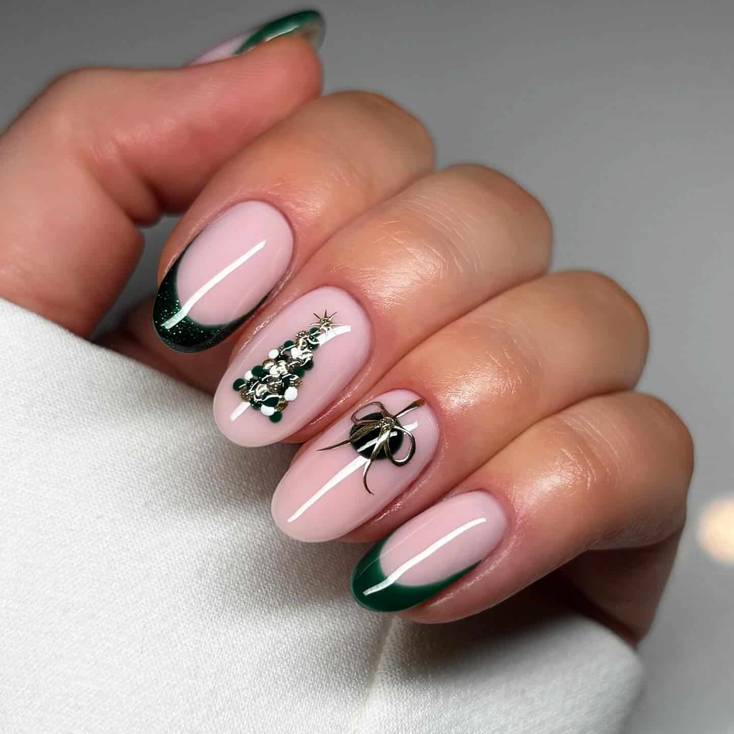 19. Short Almond Nude Nails with Green French Tips and Bow Accent - christmas nail ideas