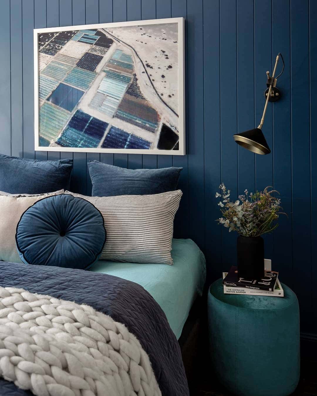 5. Contemporary Blue Accent Wall with Minimal Styling - blue bedroom ideas